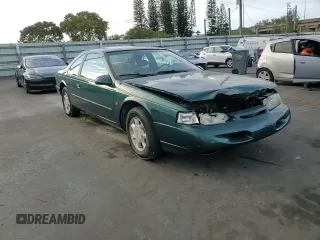 1994 Ford Thunderbird LX with VIN 1FALP62W6RH128762, listed as a Copart auction lot 84306604 with 68,314 mi miles and Salvage Title. Bid and sale history available at DreamBid. Image 11.