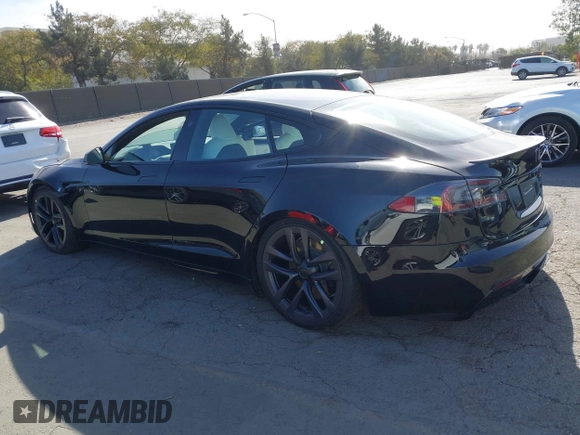 2022 Tesla Model S Plaid with VIN 5YJSA1E62NF460634, listed as a IAAI auction lot 41372644 with 16,050 mi miles and . Bid and sale history available at DreamBid. Image 14.