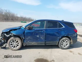 2021 Chevrolet Equinox LT z VIN 2GNAXKEV7M6146688, wystawiony jako IAAI lot #41542451 z przebiegiem 177 859 mil mil oraz . Historia ofert i sprzedaży dostępna na DreamBid. Obrazek 13.