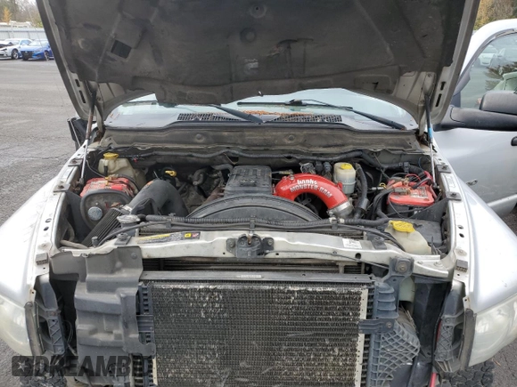 2005 Dodge 3500 SLT z VIN 3D7LS38C65G747327, wystawiony jako Copart lot #82444464 z przebiegiem 325 511 mil mil oraz Szkoda całkowita • Salvage title. Historia ofert i sprzedaży dostępna na DreamBid. Obrazek 11.