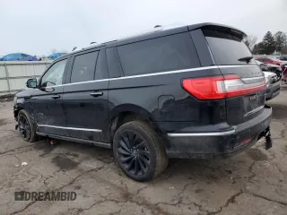 2021 Lincoln Navigator Black Label z VIN 5LMJJ3TT1MEL03959, wystawiony jako Copart lot #43876275 z przebiegiem Nie podano mil oraz Szkoda całkowita • Salvage title. Historia ofert i sprzedaży dostępna na DreamBid. Obrazek 2.