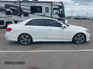 2015 Mercedes-Benz E 350 Sport with VIN WDDHF5KB1FB145337, listed as a IAAI auction lot 42137791 with 104,713 mi miles and . Bid and sale history available at DreamBid. Image 13.