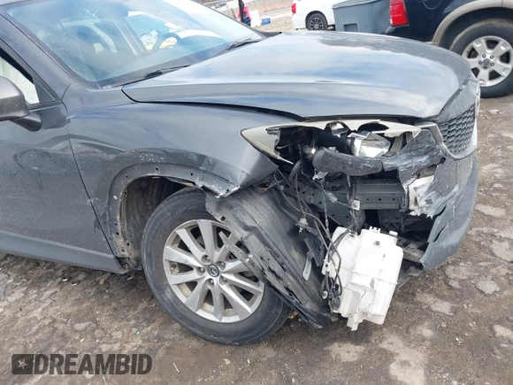 2015 Mazda CX-5 Touring with VIN JM3KE2CY2F0461935, listed as a IAAI auction lot 41430070 with 220,857 mi miles and . Bid and sale history available at DreamBid. Image 6.