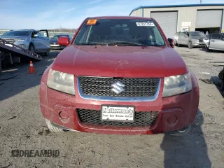 2012 Suzuki Grand Vitara Premium z VIN JS3TD0D65C4100898, wystawiony jako Copart lot #87241744 z przebiegiem Nie podano mil oraz Szkoda całkowita • Salvage title. Historia ofert i sprzedaży dostępna na DreamBid. Obrazek 5.