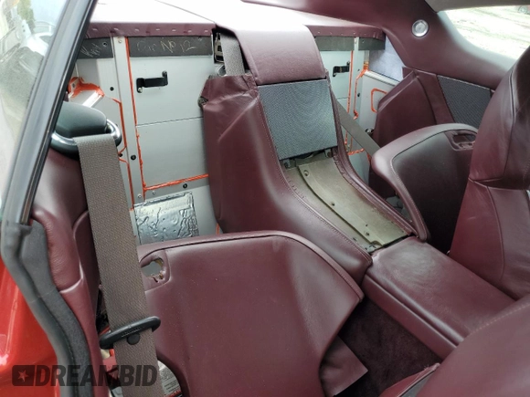 2005 Aston Martin DB9 z VIN SCFAD01A15GA00012, wystawiony jako Copart lot #65919164 z przebiegiem Nie podano mil oraz Szkody całkowita. Historia ofert i sprzedaży dostępna na DreamBid. Obrazek 10.