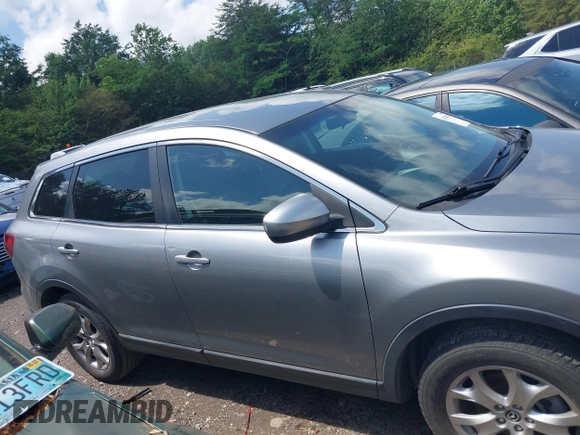 2015 Mazda CX-9 Touring with VIN JM3TB2CA2F0451180, listed as a IAAI auction lot 42180078 with 112,804 mi miles and . Bid and sale history available at carsss.com. Image 13.