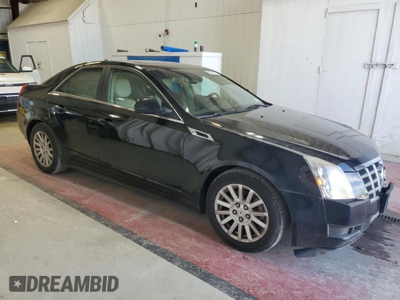 2013 Cadillac CTS Luxury z VIN 1G6DG5E57D0112818, wystawiony jako Copart lot #57937755 z przebiegiem 148 751 mil mil oraz Czysty tytuł • Clean title. Historia ofert i sprzedaży dostępna na DreamBid. Obrazek 4.