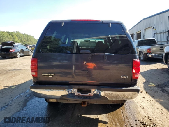2000 Ford Expedition XLT with VIN 1FMRU15L7YLA86398, listed as a Copart auction lot 75015834 with 203,915 mi miles and Salvage Title. Bid and sale history available at carsss.com. Image 6.