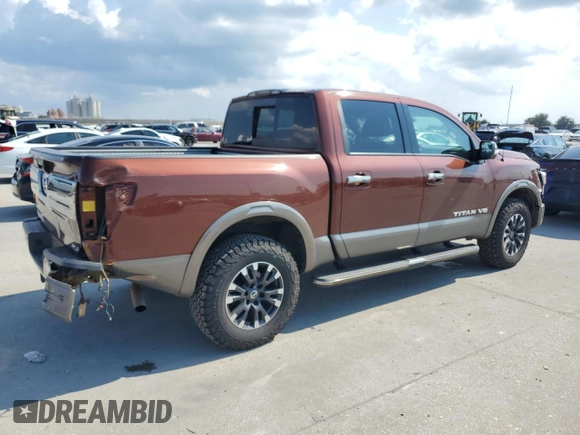 2018 Nissan Titan Pro-4X z VIN 1N6AA1E50JN526481, wystawiony jako Copart lot #71800504 z przebiegiem 147 463 mil mil oraz Szkoda całkowita • Salvage title. Historia ofert i sprzedaży dostępna na DreamBid. Obrazek 3.