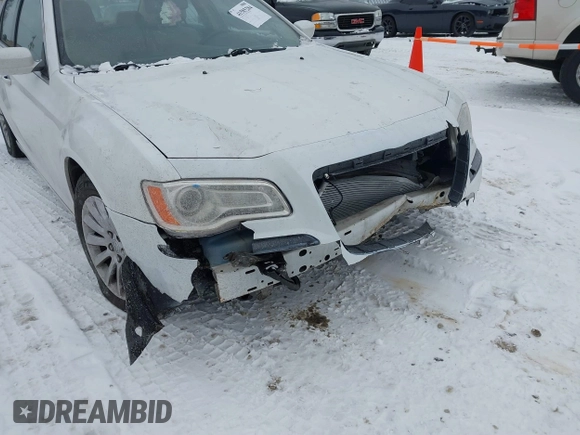 2013 Chrysler 300 z VIN 2C3CCAAG5DH743393, wystawiony jako IAAI lot #41585284 z przebiegiem 134 429 mil mil oraz . Historia ofert i sprzedaży dostępna na DreamBid. Obrazek 6.