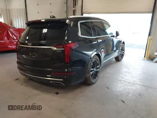2022 Cadillac XT6 Premium Luxury z VIN 1GYKPDRS0NZ131233, wystawiony jako IAAI lot #41600244 z przebiegiem 112 258 mil mil oraz . Historia ofert i sprzedaży dostępna na DreamBid. Obrazek 4.