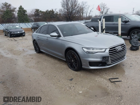 2016 Audi A6 2.0T Premium Plus with VIN WAUGFAFC1GN014536, listed as a IAAI auction lot 41937616 with 122,417 mi miles. Bid and sale history available at carsss.com. Image 1.
