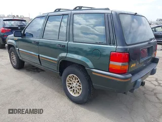 1993 Jeep Grand Cherokee Limited z VIN 1J4GZ78Y7PC531299, wystawiony jako IAAI lot #42117795 z przebiegiem 168 995 mil mil oraz . Historia ofert i sprzedaży dostępna na DreamBid. Obrazek 3.
