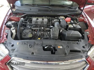 2017 Ford Taurus SEL z VIN 1FAHP2E8XHG131857, wystawiony jako Copart lot #60652585 z przebiegiem 90 000 mil mil oraz Szkoda całkowita • Salvage title. Historia ofert i sprzedaży dostępna na DreamBid. Obrazek 11.
