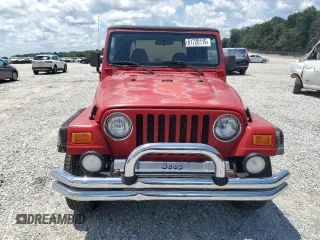 2001 Jeep Wrangler Sport with VIN 1J4FA49S51P365327, listed as a Copart auction lot 61720115 with 194,086 mi miles and Salvage title. Bid and sale history available at DreamBid. Image 5.