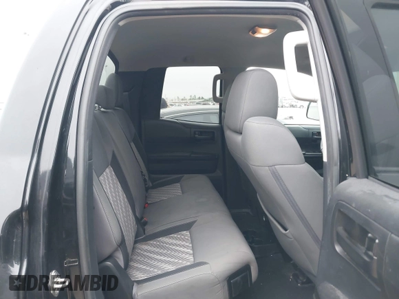 2019 Toyota Tundra SR with VIN 5TFRM5F1XKX143105, listed as a IAAI auction lot 41274567 with 180,602 mi miles and . Bid and sale history available at DreamBid. Image 8.
