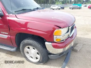 2005 GMC Yukon SLT z VIN 1GKEK13T25J164173, wystawiony jako IAAI lot #42241124 z przebiegiem 220 313 mil mil oraz . Historia ofert i sprzedaży dostępna na DreamBid. Obrazek 6.