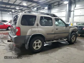 2004 Nissan Xterra XE with VIN 5N1ED28YX4C650888, listed as a Copart auction lot 57151695 with 142,210 mi miles and Salvage title. Bid and sale history available at DreamBid. Image 3.