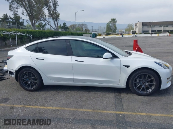 2021 Tesla Model 3 Long Range with VIN 5YJ3E1EB7MF089524, listed as a IAAI auction lot 42023474 with 19,757 mi miles and . Bid and sale history available at carsss.com. Image 14.