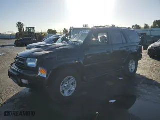 2000 Toyota 4Runner SR5 with VIN JT3HN86R1Y0317584, listed as a Copart auction lot 44157355 with 199,957 mi miles and Salvage Title. Bid and sale history available at carsss.com. Image 1.
