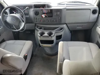 2012 Ford Econoline Wagon XL with VIN 1FBNE3BL0CDA29810, listed as a Copart auction lot 79014034 with 180,514 mi miles and Salvage Title. Bid and sale history available at carsss.com. Image 8.