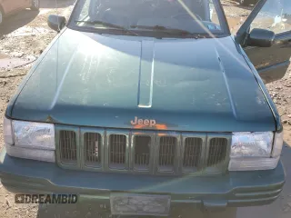 1997 Jeep Grand Cherokee Limited with VIN 1J4GZ78Y2VC728605, listed as a Copart auction lot 83342804 with 104,185 mi miles and Salvage Title. Bid and sale history available at carsss.com. Image 13.