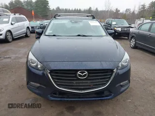 2018 Mazda 3 Touring with VIN 3MZBN1L34JM204883, listed as a IAAI auction lot 41094541 with 125,205 mi miles and . Bid and sale history available at DreamBid. Image 12.