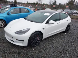 2023 Tesla Model 3 Performance z VIN 5YJ3E1EC9PF545648, wystawiony jako IAAI lot #41573583 z przebiegiem 15 207 mil mil oraz . Historia ofert i sprzedaży dostępna na DreamBid. Obrazek 2.