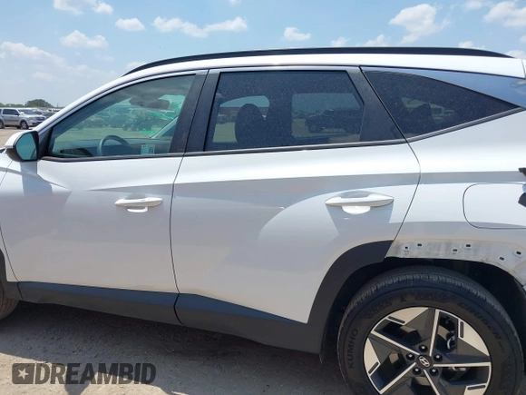 2025 Hyundai Tucson SEL z VIN 5NMJB3DE6SH461535, wystawiony jako IAAI lot #42337372 z przebiegiem 19 791 mil mil oraz . Historia ofert i sprzedaży dostępna na DreamBid. Obrazek 14.
