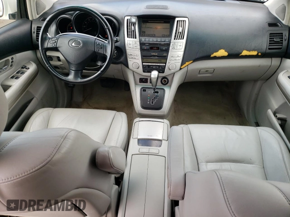 2006 Lexus RX 400h with VIN JTJHW31UX60023361, listed as a Copart auction lot 60489355 with 112,087 mi miles and Salvage title. Bid and sale history available at DreamBid. Image 8.