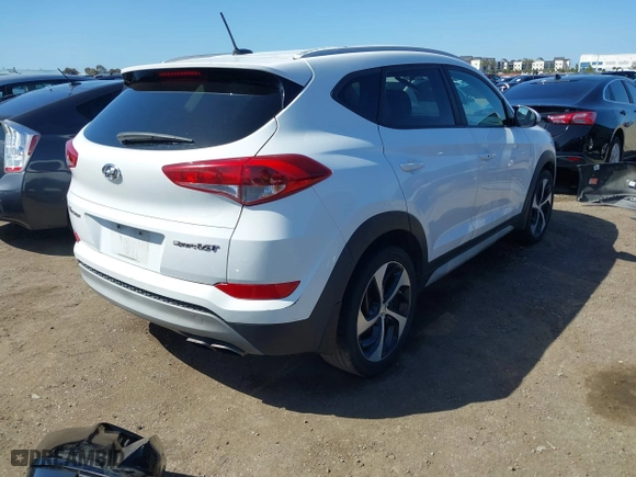 2017 Hyundai Tucson Value with VIN KM8J33A27HU438902, listed as a IAAI auction lot 41835502 with 84,885 mi miles. Bid and sale history available at carsss.com. Image 4.