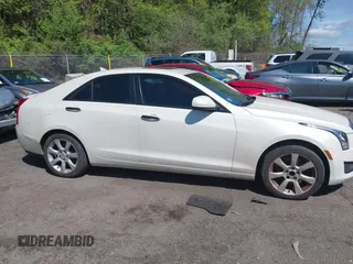 2013 Cadillac ATS with VIN 1G6AG5RX5D0178136, listed as a IAAI auction lot 42220395 with 147,066 mi miles and . Bid and sale history available at DreamBid. Image 13.