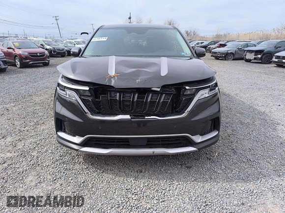2024 Kia Carnival EX with VIN KNDNC5H31R6421390, listed as a Copart auction lot 55661565 with 18,515 mi miles and Salvage Title. Bid and sale history available at DreamBid. Image 5.