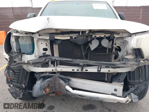 2014 Toyota Tacoma PreRunner z VIN 3TMJU4GN3EM170360, wystawiony jako IAAI lot #42438394 z przebiegiem 223 101 mil mil oraz . Historia ofert i sprzedaży dostępna na DreamBid. Obrazek 6.