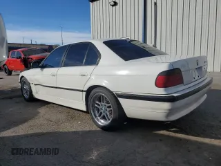 2000 BMW 7 Series 740iA with VIN WBAGG8341YDN78262, listed as a Copart auction lot 77690714 with 217,607 mi miles and Salvage Title. Bid and sale history available at carsss.com. Image 2.