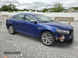 2015 Ford Taurus Limited with VIN 1FAHP2J85FG133521, listed as a Copart auction lot 57411685 with 140,535 mi miles and Salvage title. Bid and sale history available at DreamBid. Image 4.