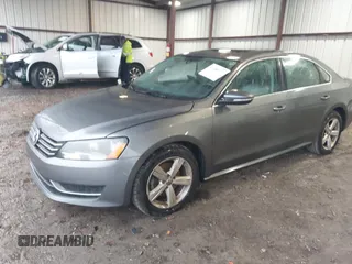 2012 Volkswagen Passat SE with VIN 1VWBH7A38CC053564, listed as a IAAI auction lot 41488237 with 188,636 mi miles and . Bid and sale history available at DreamBid. Image 2.