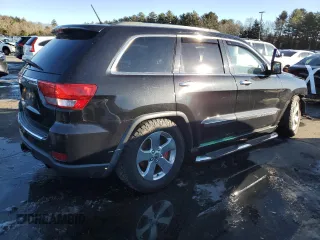 2013 Jeep Grand Cherokee Overland with VIN 1C4RJFCTXDC525097, listed as a Copart auction lot 42250875 with 214,368 mi miles and Salvage Title. Bid and sale history available at carsss.com. Image 3.