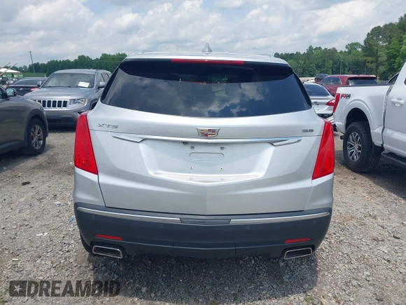 2018 Cadillac XT5 FWD with VIN 1GYKNARS4JZ142654, listed as a IAAI auction lot 42275794 with 112,790 mi miles and . Bid and sale history available at DreamBid. Image 16.