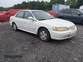 2002 Honda Accord EX z VIN 1HGCG16522A052343, wystawiony jako IAAI lot #42491221 z przebiegiem 164 037 mil mil oraz . Historia ofert i sprzedaży dostępna na DreamBid. Obrazek 1.