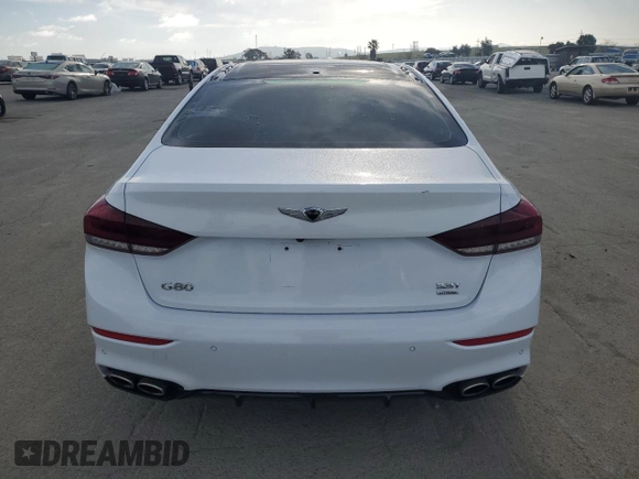 2018 Genesis G80 Sport with VIN KMHGN4JB7JU241017, listed as a Copart auction lot 52548865 with 90,560 mi miles and Salvage title. Bid and sale history available at DreamBid. Image 6.