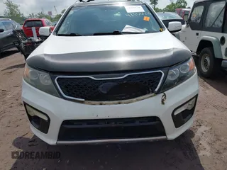 2012 Kia Sorento SX z VIN 5XYKWDA23CG231228, wystawiony jako IAAI lot #42366536 z przebiegiem 154 627 mil mil oraz . Historia ofert i sprzedaży dostępna na DreamBid. Obrazek 12.