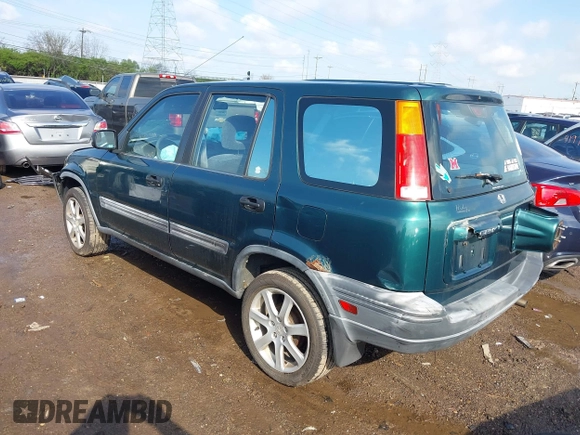 1999 Honda CR-V LX with VIN JHLRD1847XC049104, listed as a IAAI auction lot 42002338 with 213,503 mi miles. Bid and sale history available at carsss.com. Image 3.