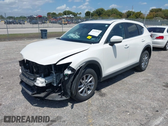 2022 Mazda CX-5 2.5 S Preferred Package with VIN JM3KFBCM1N1575573, listed as a IAAI auction lot 41976604 with 45,113 mi miles. Bid and sale history available at carsss.com. Image 2.