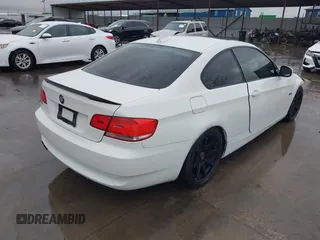 2010 BMW 3 Series 328i with VIN WBAWB3C57AP138864, listed as a IAAI auction lot 41507300 with 129,657 mi miles. Bid and sale history available at carsss.com. Image 4.