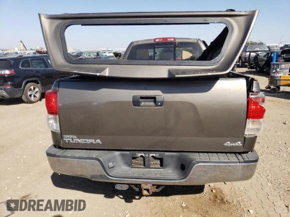 2010 Toyota Tundra 4WD Truck with VIN 5TFCY5F18AX009492, listed as a Copart auction lot 74092164 with 210,981 mi miles and Clean Title. Bid and sale history available at carsss.com. Image 6.