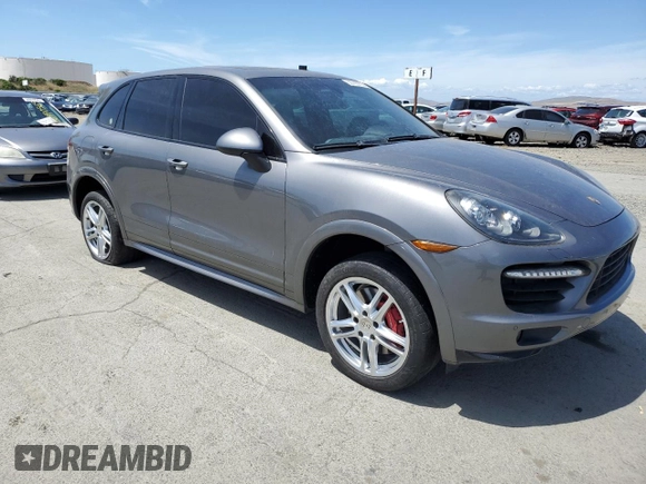 2013 Porsche Cayenne GTS with VIN WP1AD2A27DLA75169, listed as a Copart auction lot 56705735 with 148,880 mi miles and Salvage title. Bid and sale history available at DreamBid. Image 4.