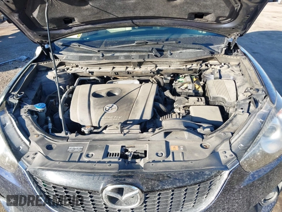 2014 Mazda CX-5 Touring with VIN JM3KE2CY8E0375009, listed as a IAAI auction lot 41420045 with 138,404 mi miles. Bid and sale history available at carsss.com. Image 10.