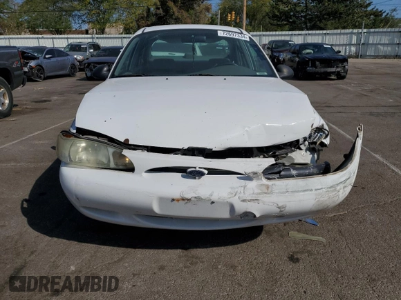 2002 Ford Escort Fleet Standard z VIN 3FAFP13P62R137425, wystawiony jako Copart lot #72697334 z przebiegiem 137 921 mil mil oraz Szkoda całkowita • Salvage title. Historia ofert i sprzedaży dostępna na DreamBid. Obrazek 5.