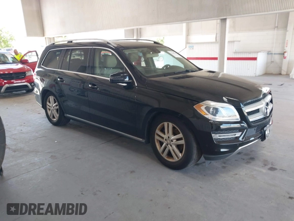 2014 Mercedes-Benz GL 450 z VIN 4JGDF7CE7EA435479, wystawiony jako IAAI lot #42280243 z przebiegiem 138 930 mil mil oraz . Historia ofert i sprzedaży dostępna na DreamBid. Obrazek 1.